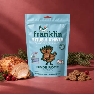 Sachet de friandises de Noël Franklin Rituels d’hiver à la dinde et à la cranberry pour chien, sur fond rouge